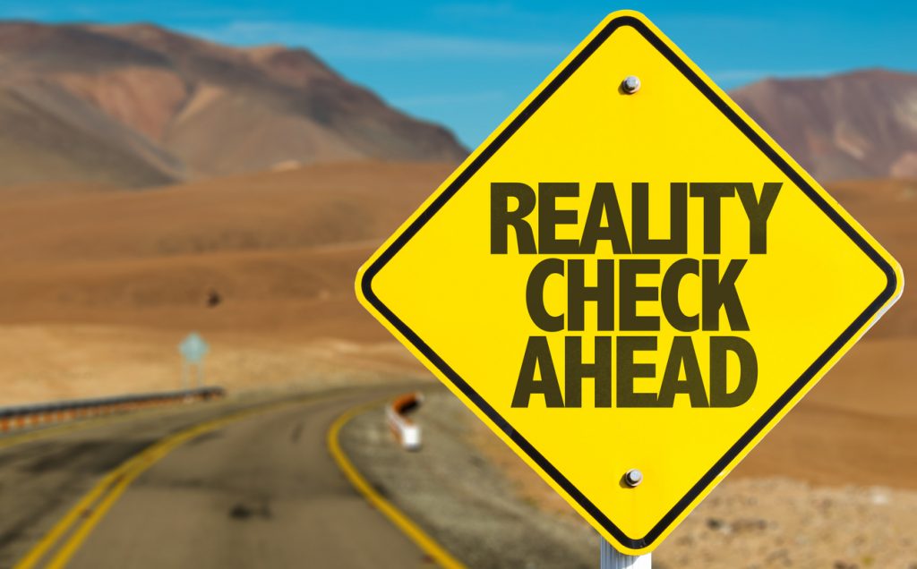 Road sign: Reality check ahead